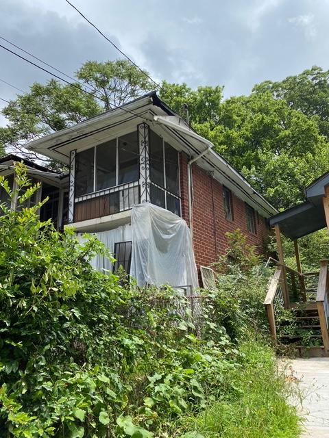 Front side of a leaky, neglected, rented quadplex in English Avenue 2020.